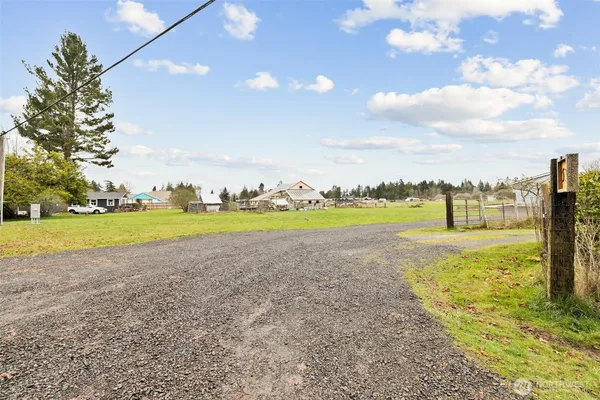 a view of a swimming pool and an outdoor seating