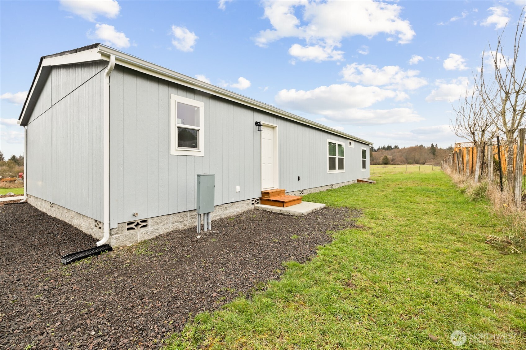 591 North Lees Creek Road Port Angeles, WA 98362 - Photo 36 of 39 a view of a house with backyard and garden