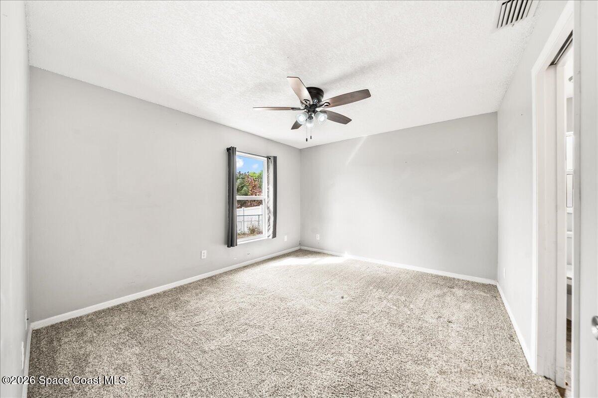 1157 Aron Street Cocoa, FL 32927 - Photo 10 of 39 Primary Bedroom
