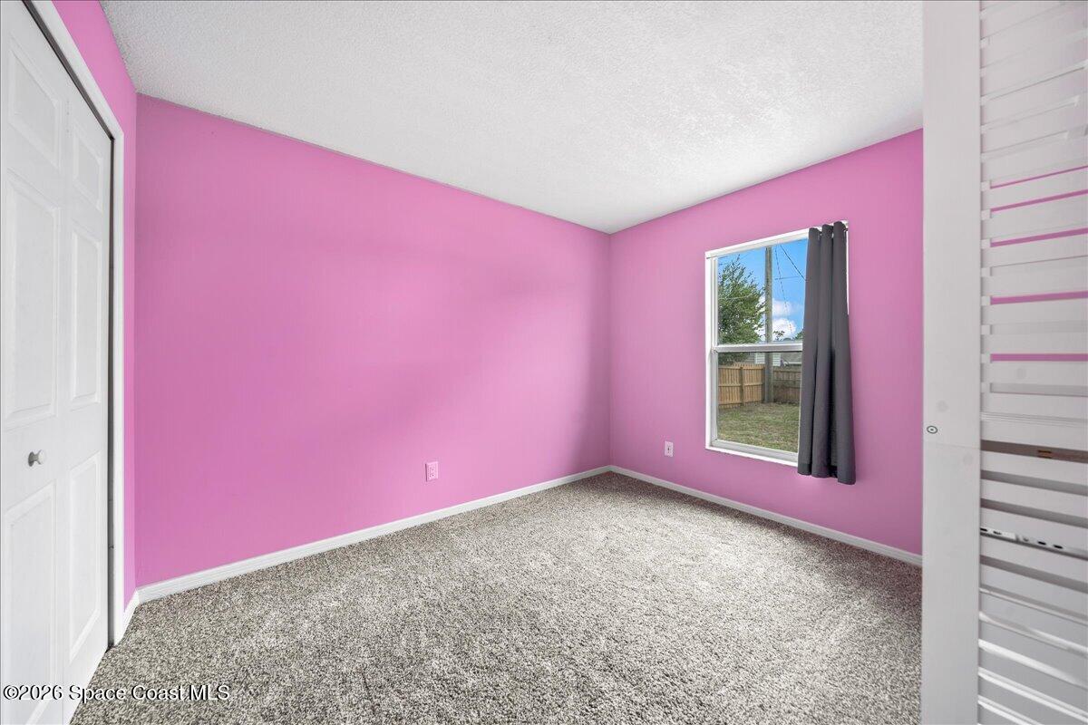 1157 Aron Street Cocoa, FL 32927 - Photo 17 of 39 Bedroom 3 with closet built ins