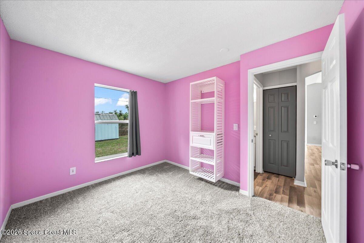 1157 Aron Street Cocoa, FL 32927 - Photo 18 of 39 Bedroom 3 Attached Organization