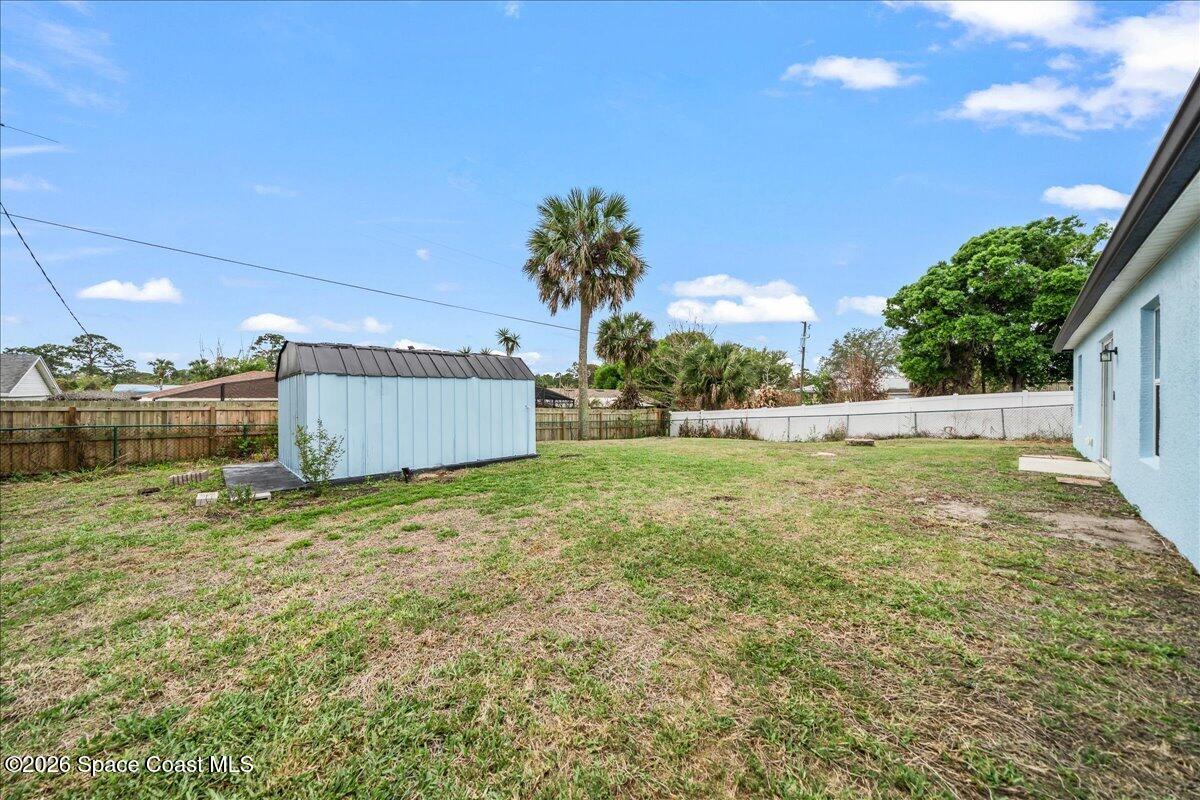 1157 Aron Street Cocoa, FL 32927 - Photo 24 of 39 Backyard View to West .23 acres!