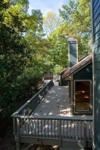 a view of a balcony with two plants
