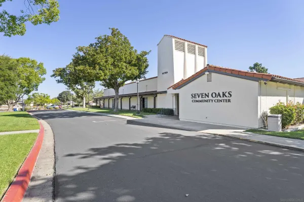 a view of a street with a building in the background