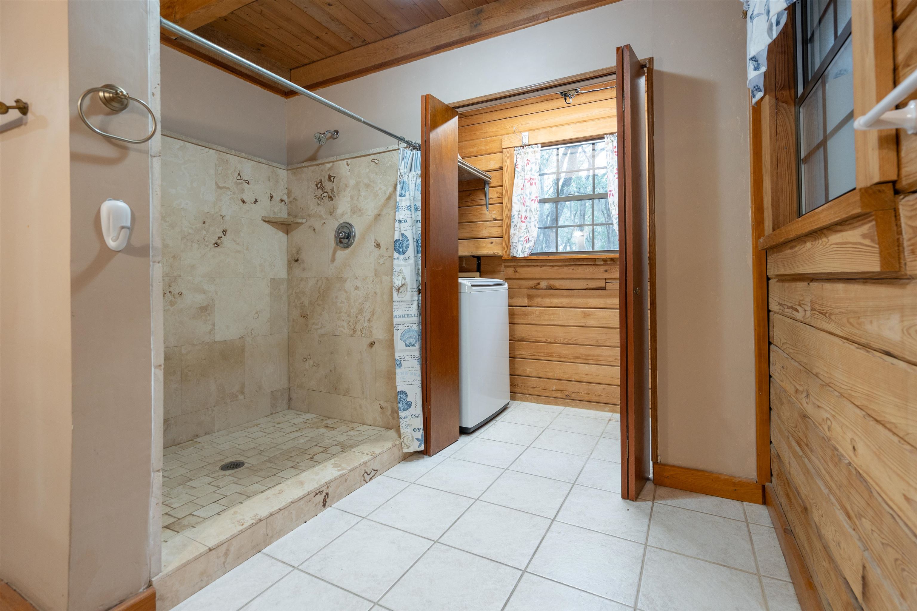 5850 Capo Island Road St. Augustine, FL 32095 - Photo 19 of 39 a bathroom with a shower