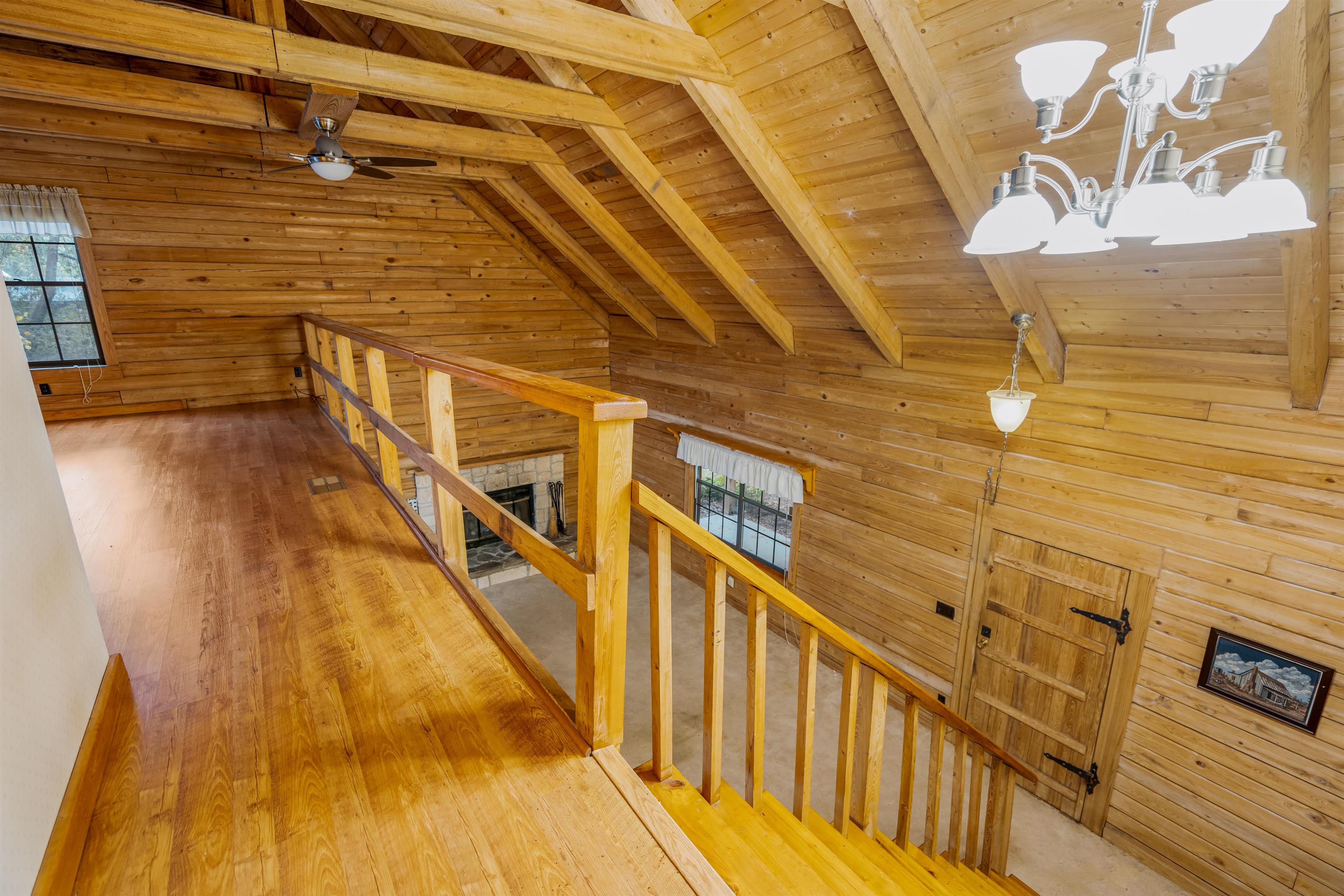 5850 Capo Island Road St. Augustine, FL 32095 - Photo 22 of 39 a view of balcony with wooden floor