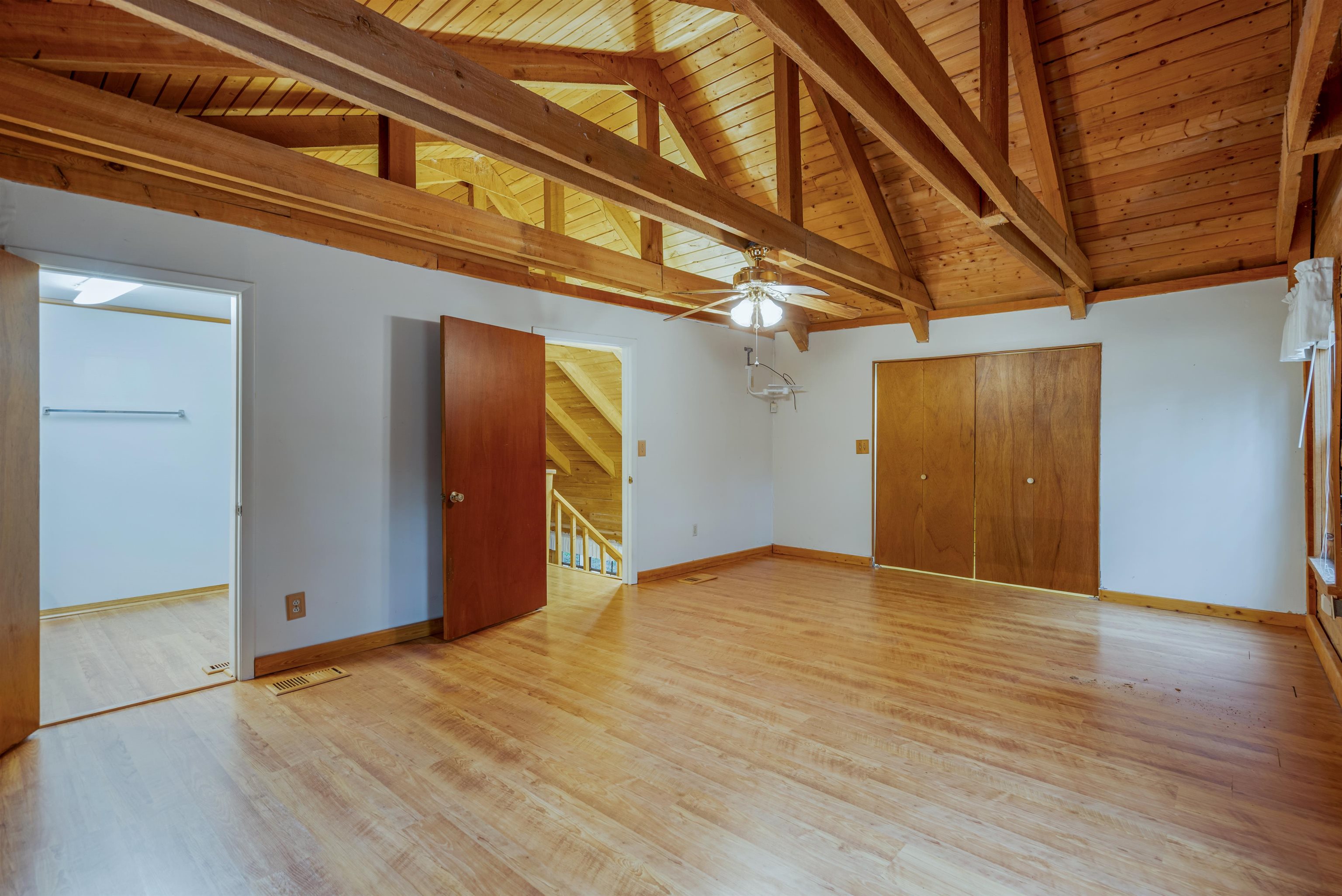 5850 Capo Island Road St. Augustine, FL 32095 - Photo 30 of 39 an empty room with wooden floor