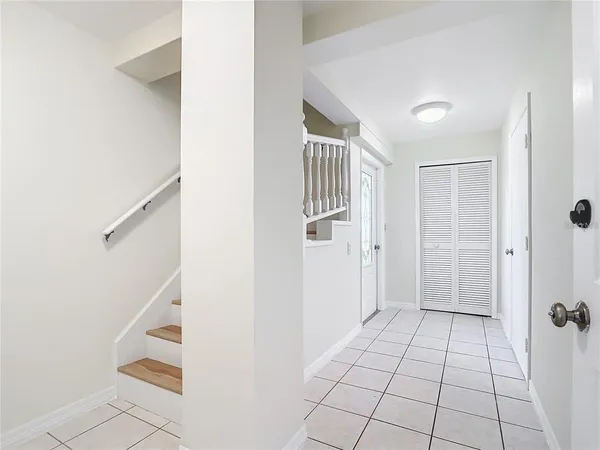 a kitchen with a stove sink and refrigerator