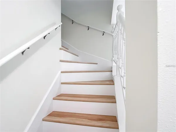 a kitchen with a stove sink and refrigerator