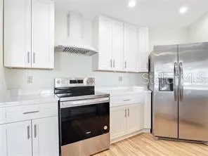 a bathroom with a bathtub and toilet