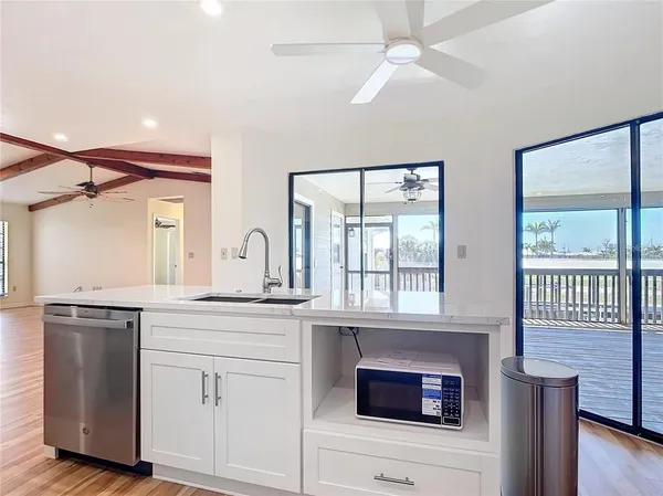 a bathroom with a double vanity sink mirror and