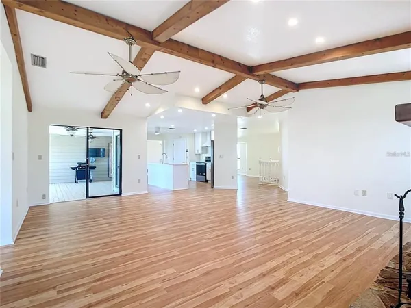 a bathroom with a tub shower and sink