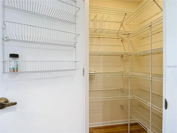 a view of a swimming pool with a lake view and mountain view