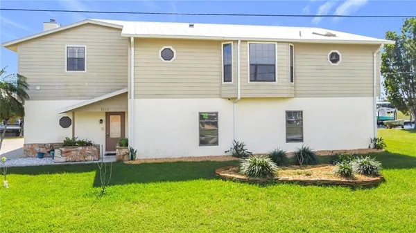 a view of a livingroom with wooden floor