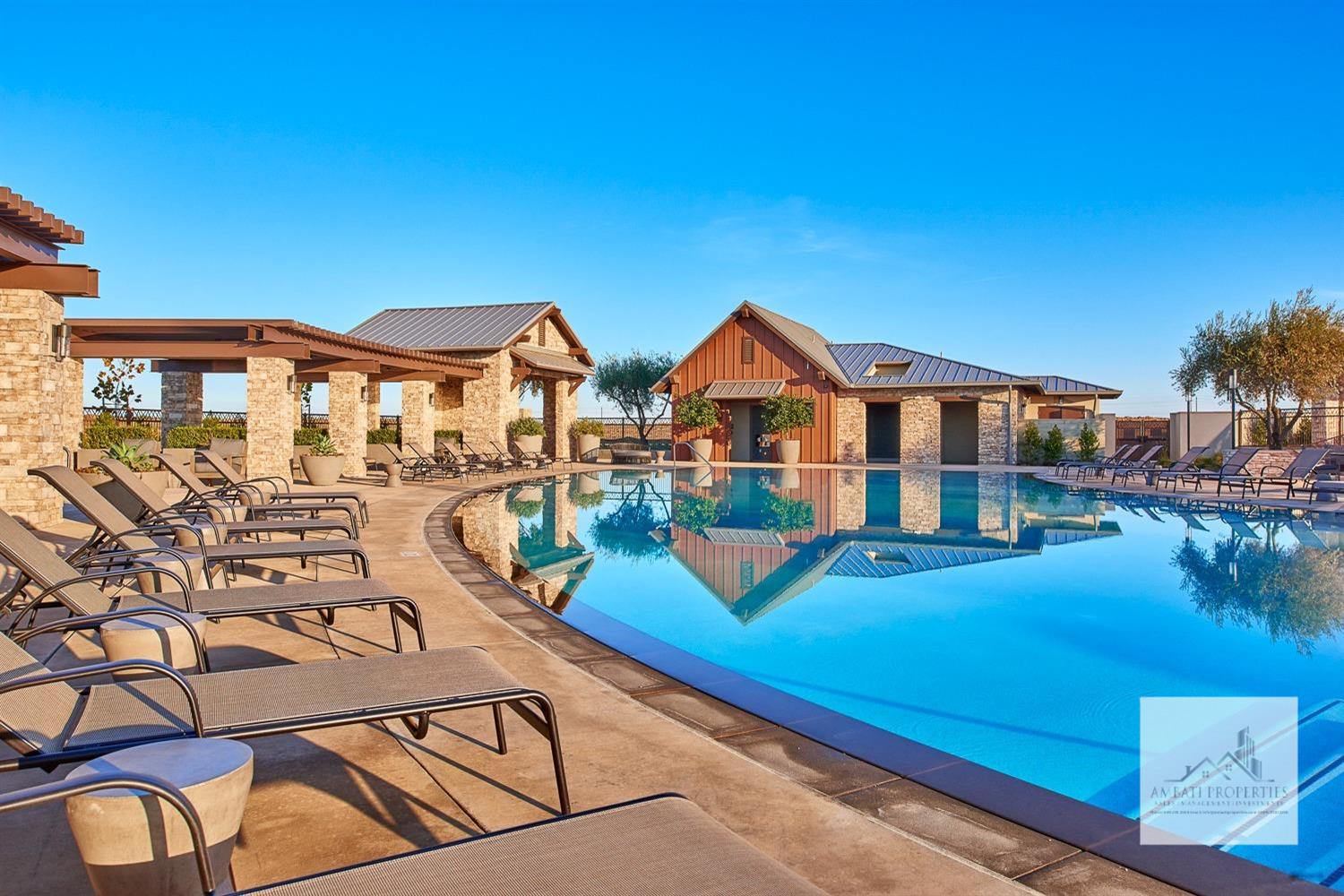 334 Aria Avenue South Madera, CA 93636 - Photo 15 of 20 a view of a house with pool and chairs