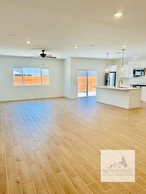 334 Aria Avenue South Madera, CA 93636 - Photo 7 of 20 a view of a kitchen with a sink and a window