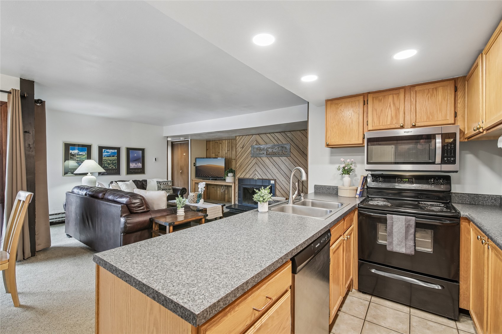423 Wild Irishman Road, Unit 1008 1009 Keystone, CO 80435 - Photo 10 of 28 a kitchen with sink a stove and refrigerator