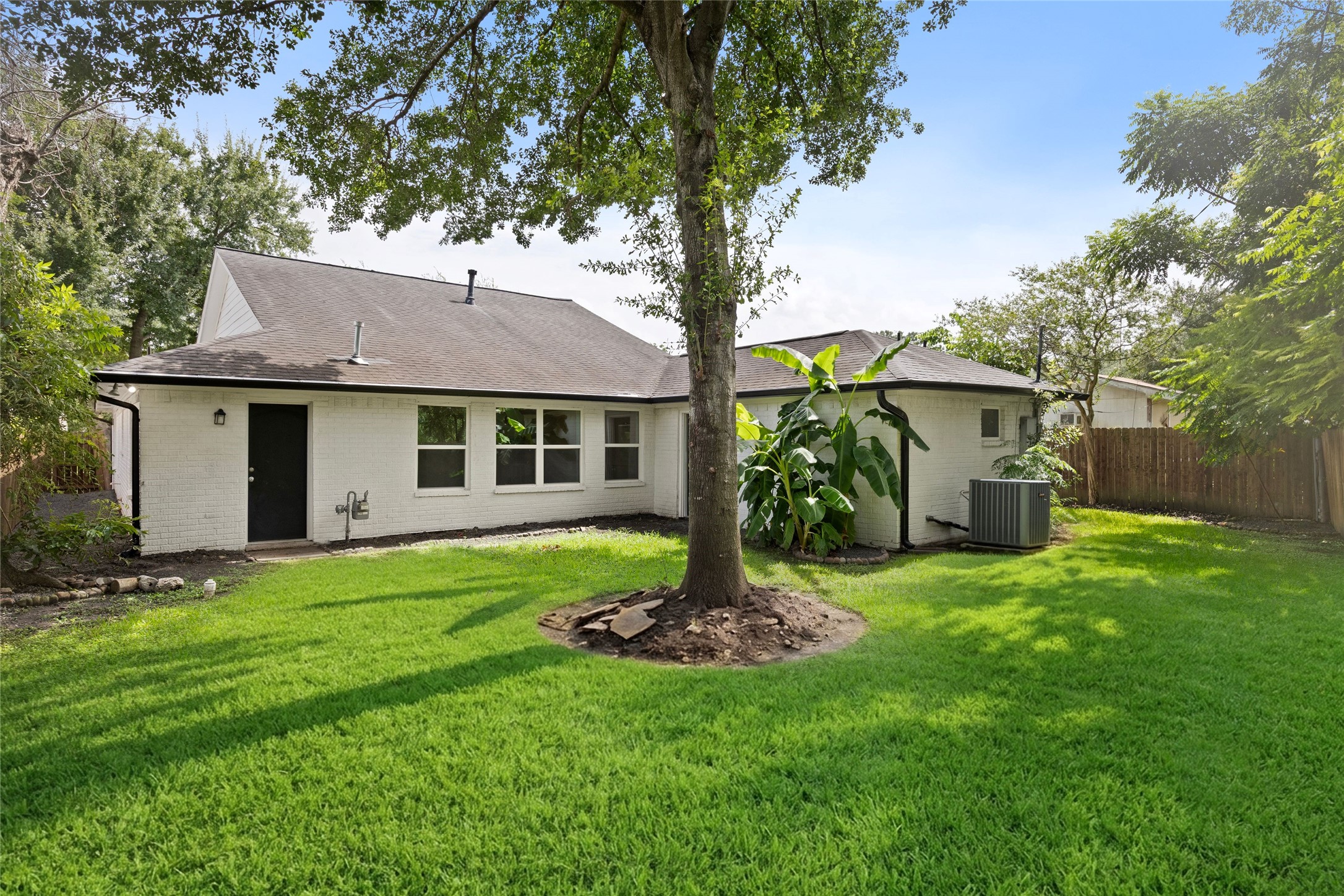 2836 Lockett Street Houston, TX 77021 - Photo 17 of 22 a front view of a house with a garden
