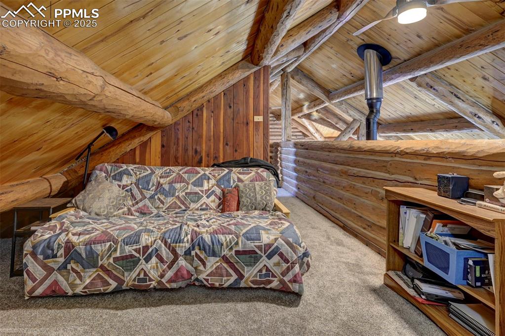 14475 Yoder Road Calhan, CO 80808 - Photo 24 of 50 a view of a room with wooden walls