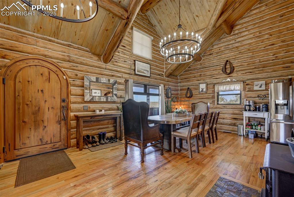 14475 Yoder Road Calhan, CO 80808 - Photo 8 of 50 a view of a dining room with furniture window and wooden floor
