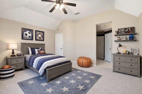a room with furniture and pool table