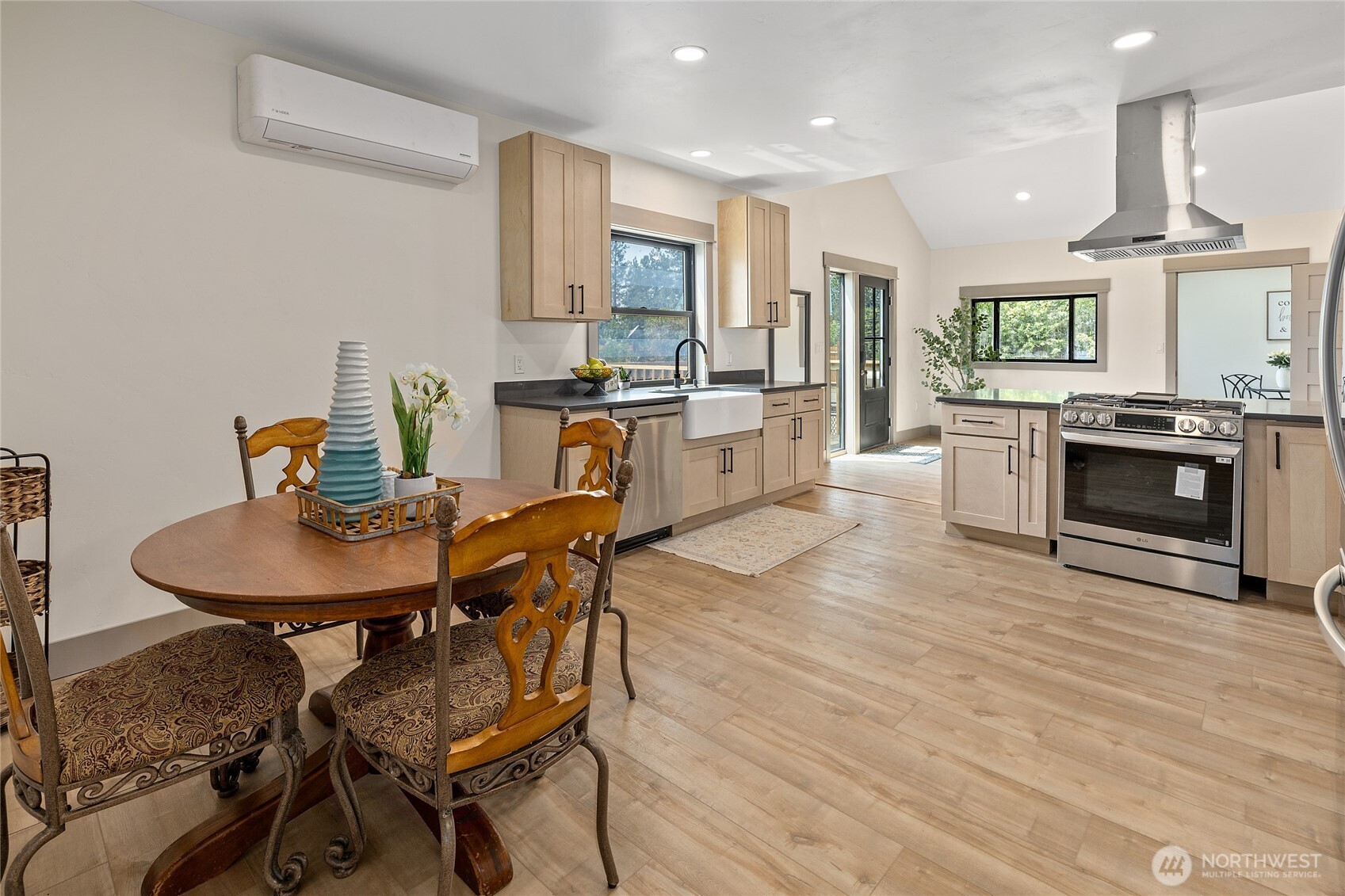 70 Gobblers Knob Road Cle Elum, WA 98922 - Photo 12 of 30 a kitchen with sink cabinets dining table and chairs