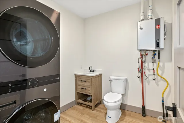 a bathroom with a toilet and a sink