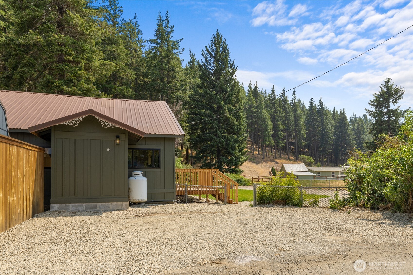 70 Gobblers Knob Road Cle Elum, WA 98922 - Photo 23 of 30 a front view of a house with a yard and garage