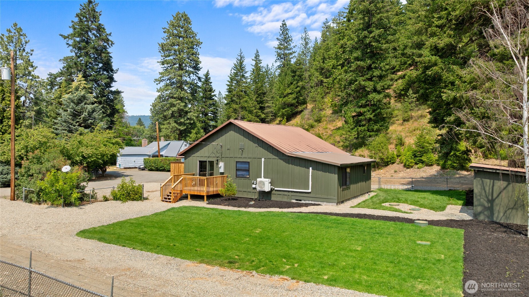 70 Gobblers Knob Road Cle Elum, WA 98922 - Photo 28 of 30 a front view of a house with a yard and trees