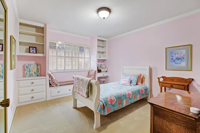 a view of swimming pool from a balcony