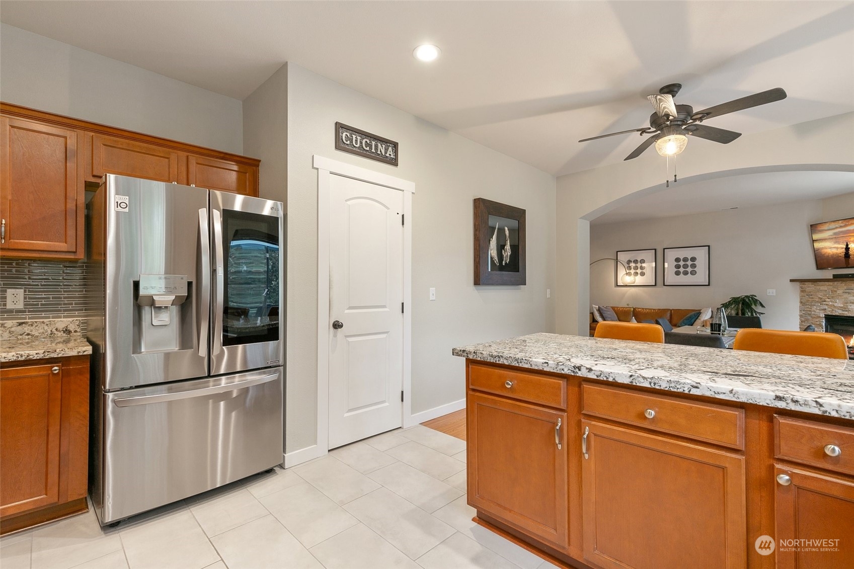 573 Field Place Northeast Renton, WA 98059 - Photo 13 of 34 a kitchen with stainless steel appliances granite countertop a refrigerator and a sink