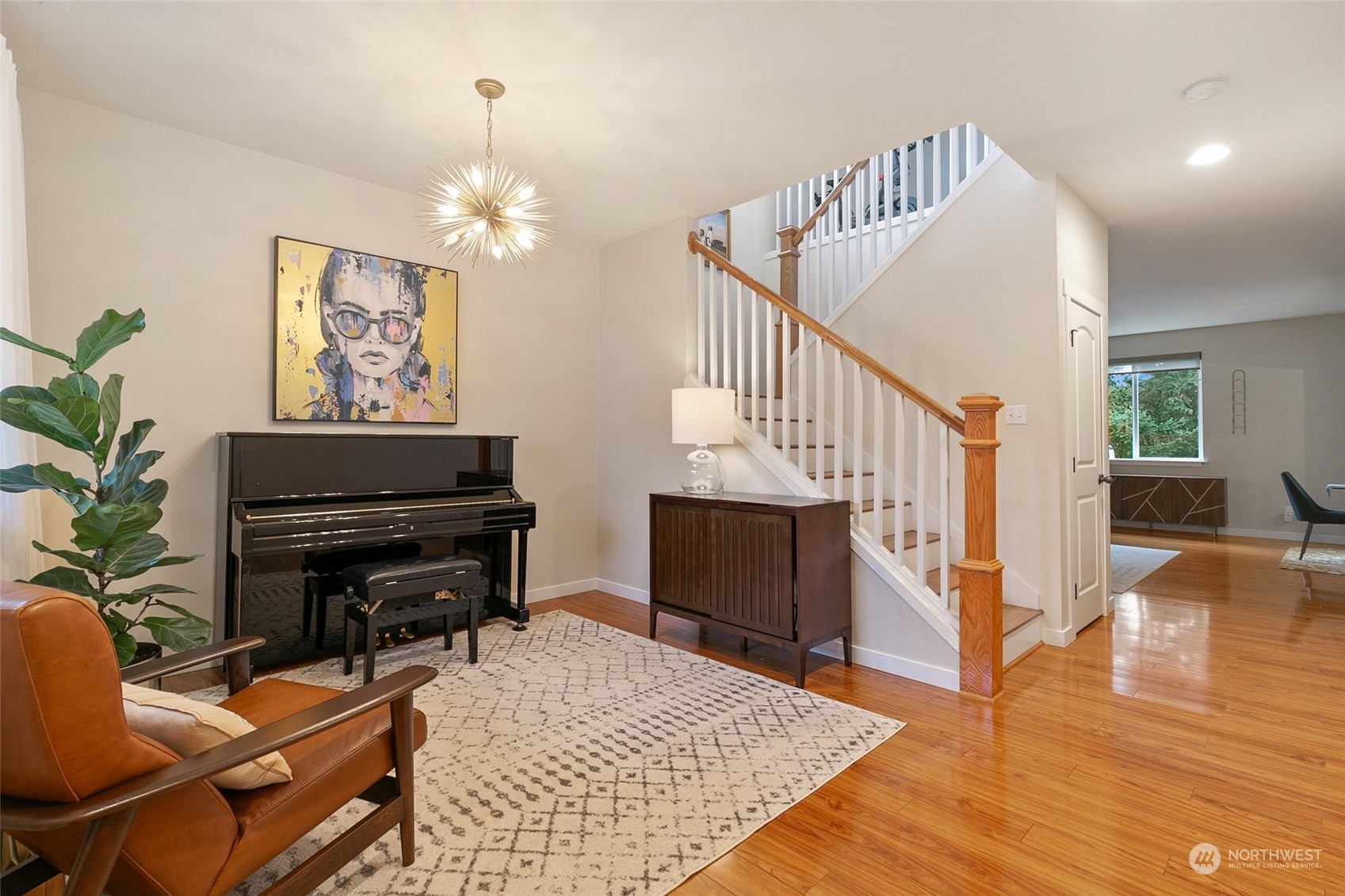 573 Field Place Northeast Renton, WA 98059 - Photo 15 of 34 a living room with furniture and a fireplace