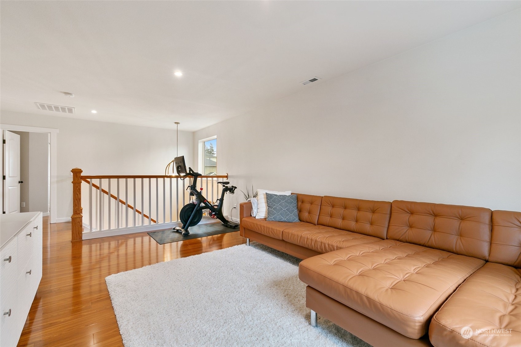 573 Field Place Northeast Renton, WA 98059 - Photo 17 of 34 a living room with a couch