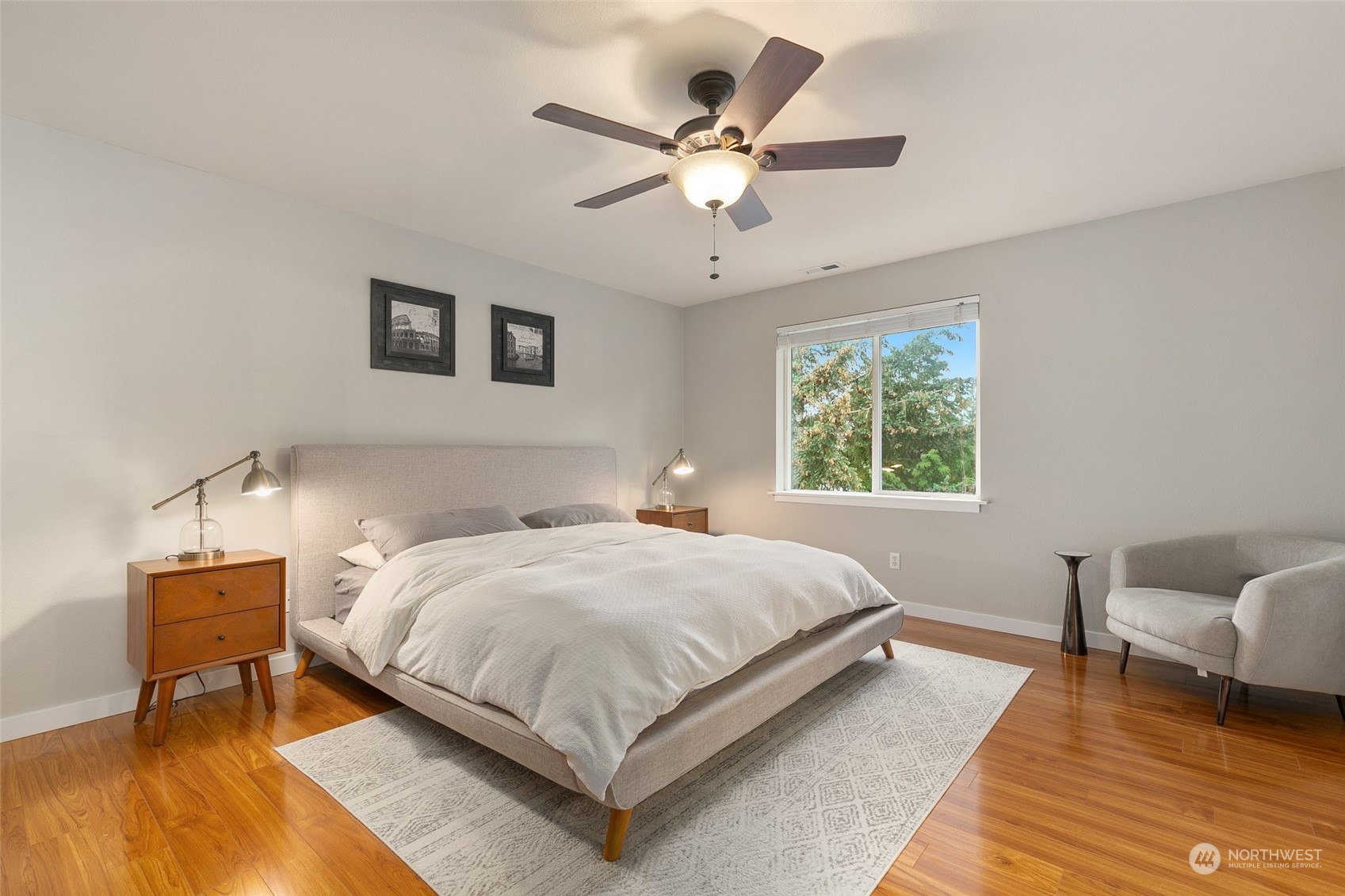 573 Field Place Northeast Renton, WA 98059 - Photo 20 of 34 a bedroom with a bed and a chair