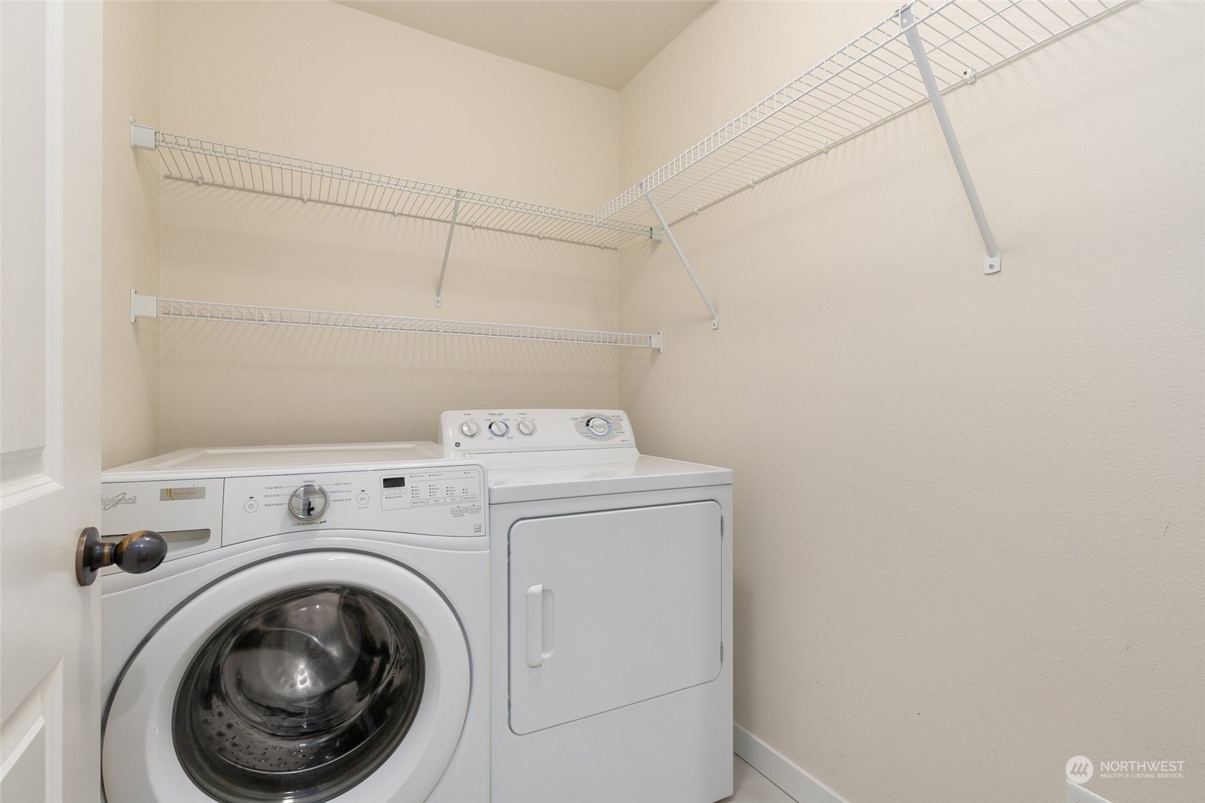 573 Field Place Northeast Renton, WA 98059 - Photo 28 of 34 a utility room with dryer and washer