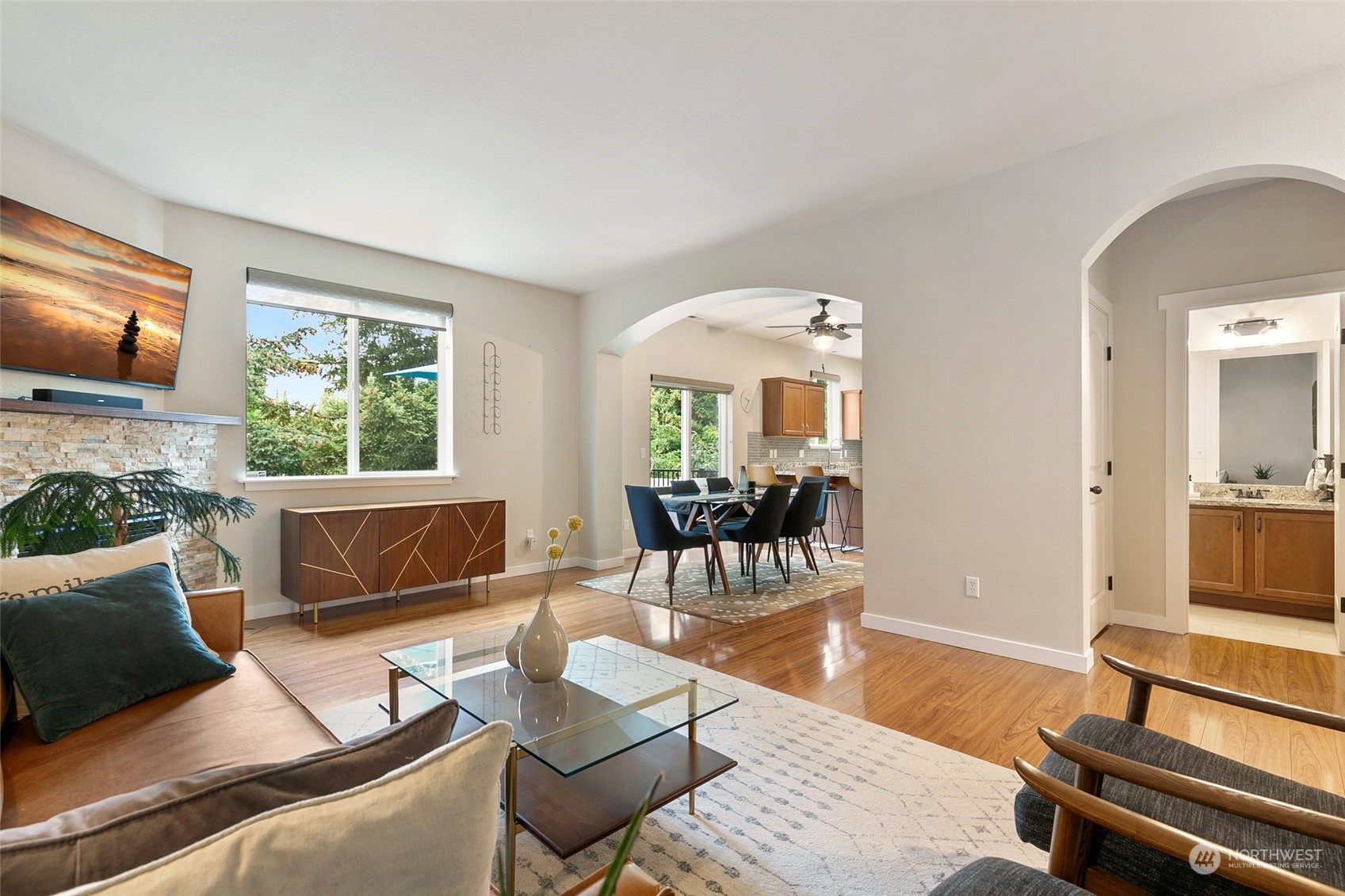 573 Field Place Northeast Renton, WA 98059 - Photo 5 of 34 a living room with furniture and a flat screen tv
