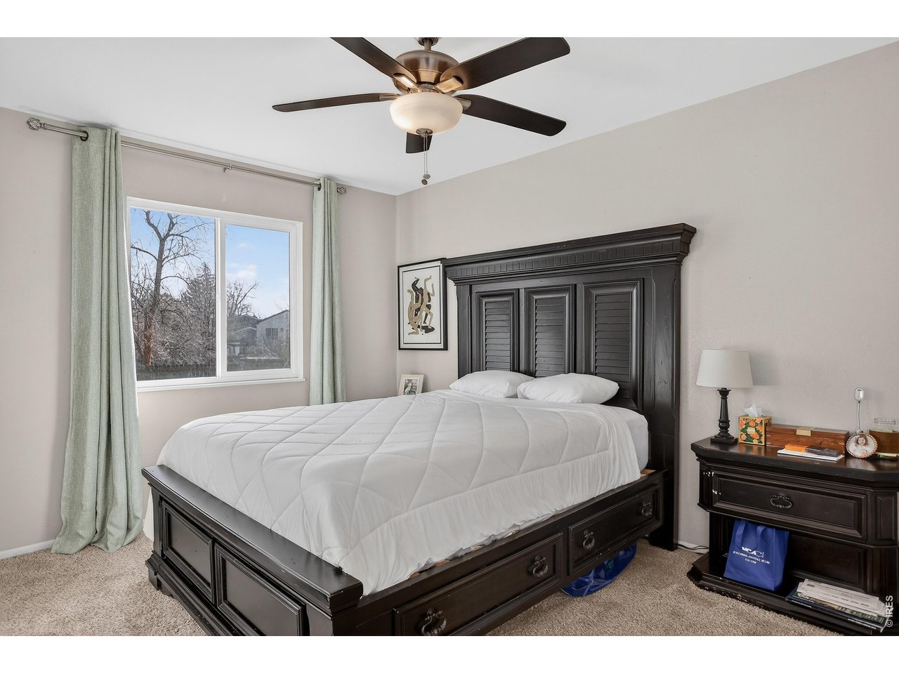 10696 Newcombe Street Westminster, CO 80021 - Photo 15 of 36 a bedroom with a bed and a window