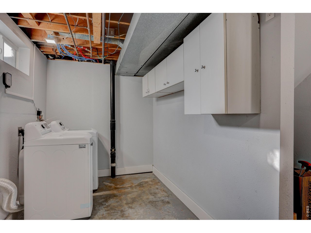 10696 Newcombe Street Westminster, CO 80021 - Photo 28 of 36 a utility room with dryer and washer