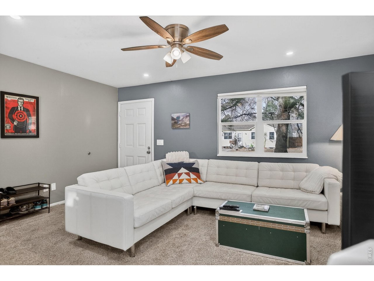 10696 Newcombe Street Westminster, CO 80021 - Photo 4 of 36 a living room with furniture and window