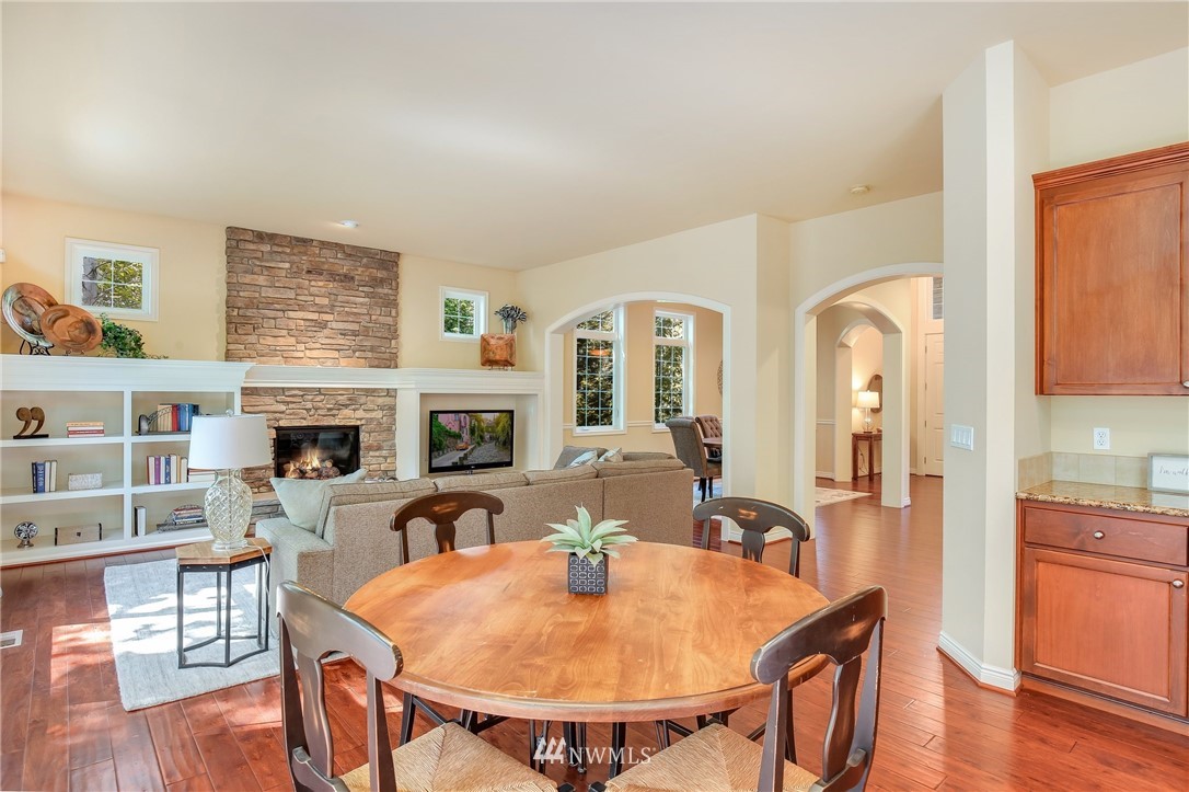 807 South 36th Place Renton, WA 98055 - Photo 13 of 39 a dining room with furniture and wooden floor
