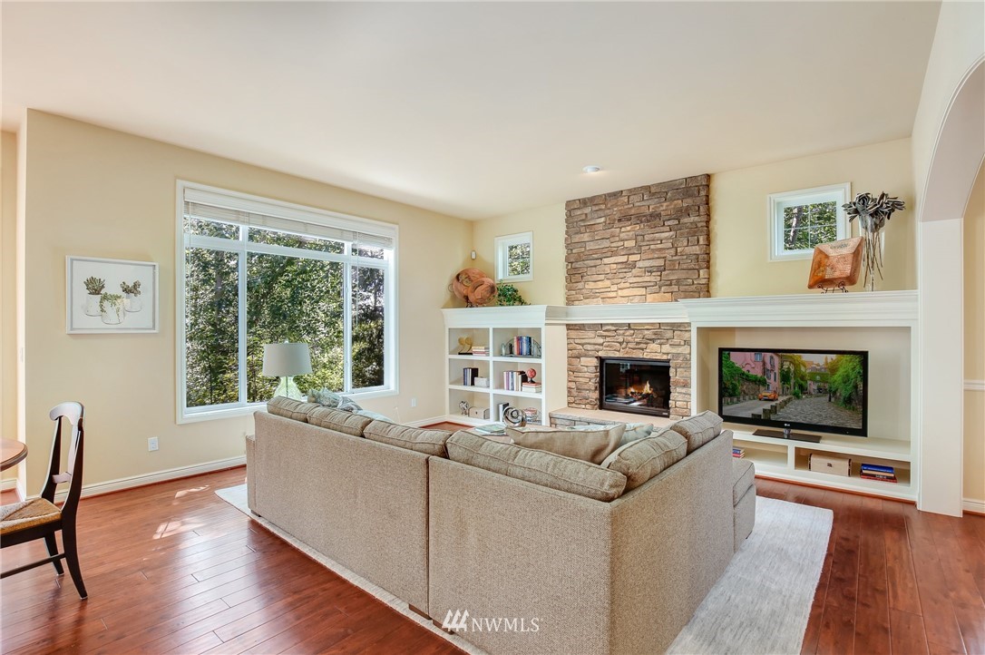 807 South 36th Place Renton, WA 98055 - Photo 18 of 39 a living room with furniture and a fireplace