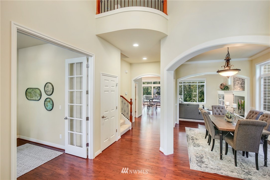 807 South 36th Place Renton, WA 98055 - Photo 3 of 39 a view of a hallway with furniture and wooden floor