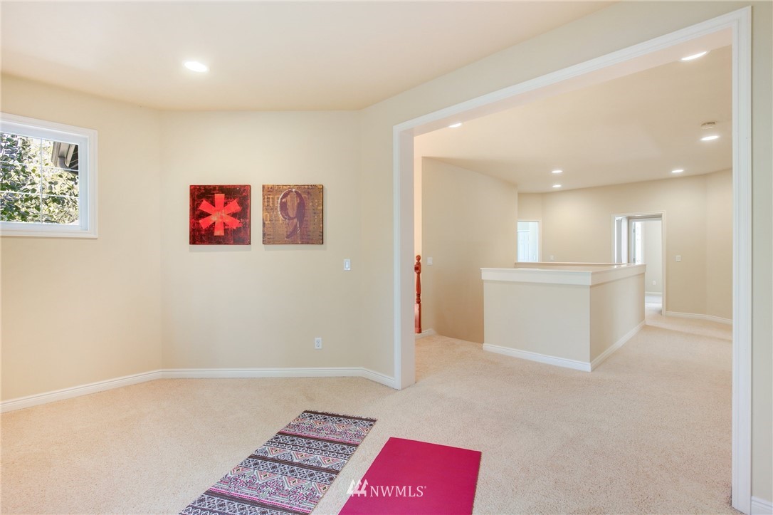 807 South 36th Place Renton, WA 98055 - Photo 22 of 39 a view of kitchen with furniture and wooden floor