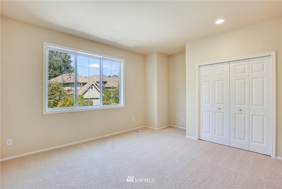 807 South 36th Place Renton, WA 98055 - Photo 32 of 39 an empty room with windows