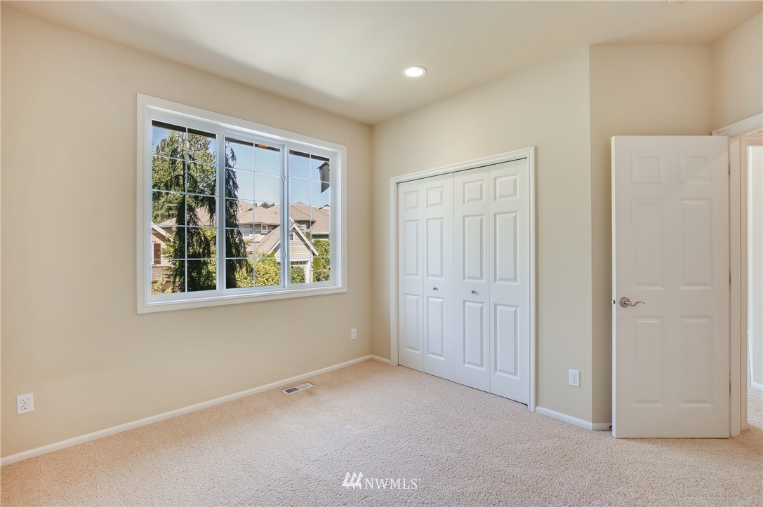 807 South 36th Place Renton, WA 98055 - Photo 33 of 39 an empty room with windows