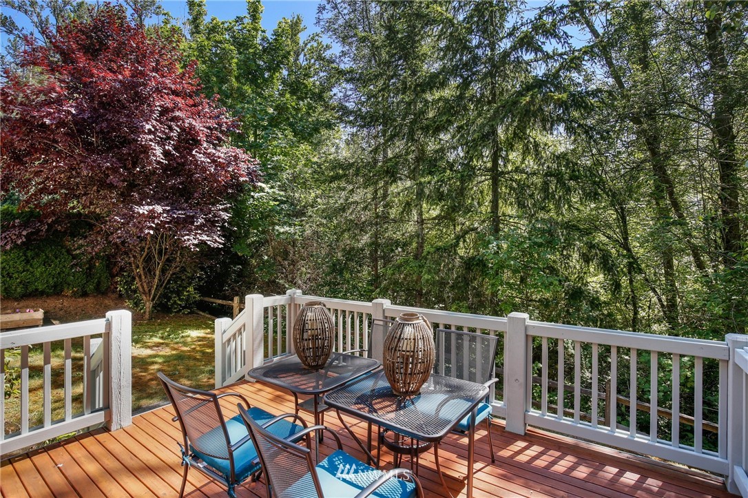 807 South 36th Place Renton, WA 98055 - Photo 36 of 39 a view of a chairs and table on the wooden floor