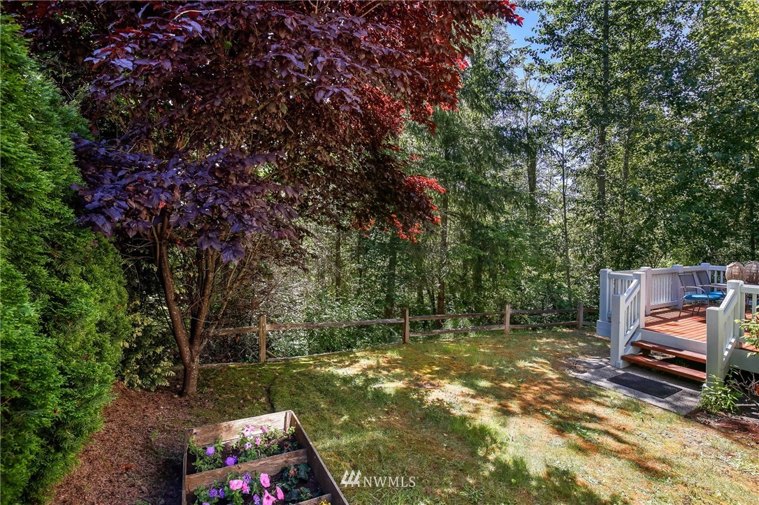 807 South 36th Place Renton, WA 98055 - Photo 38 of 39 a view of a backyard with sitting area