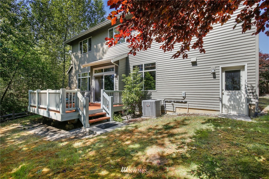807 South 36th Place Renton, WA 98055 - Photo 39 of 39 a front view of a house with a yard table and chairs