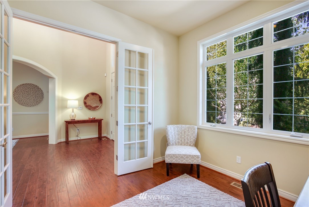 807 South 36th Place Renton, WA 98055 - Photo 5 of 39 a view of a livingroom with furniture and windows