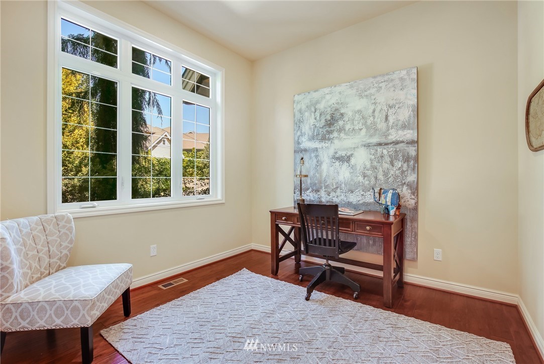 807 South 36th Place Renton, WA 98055 - Photo 6 of 39 a workspace with furniture and a window